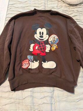 Disney Brown Mickey Mouse Graphic Sweatshirt with Red Plaid Accent